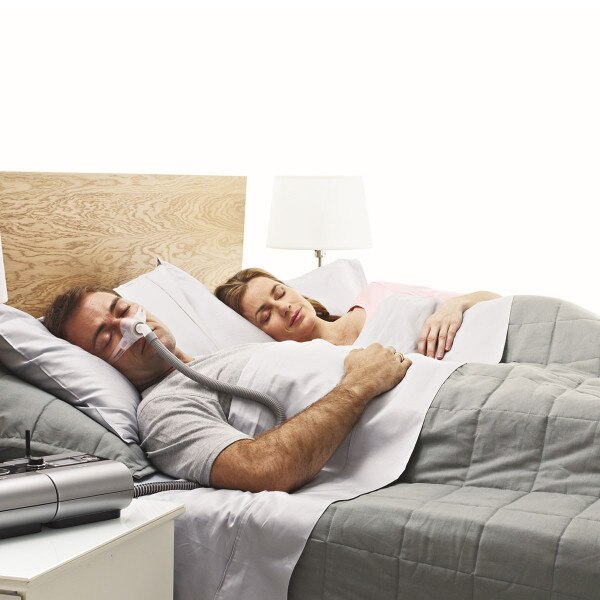 Couple Asleep Man Wearing Nano Mask